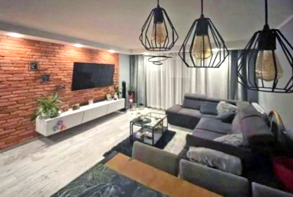 druga strona pokoju gościnnego w luksusowym apartamencie na sprzedaż Katowice (okolice)