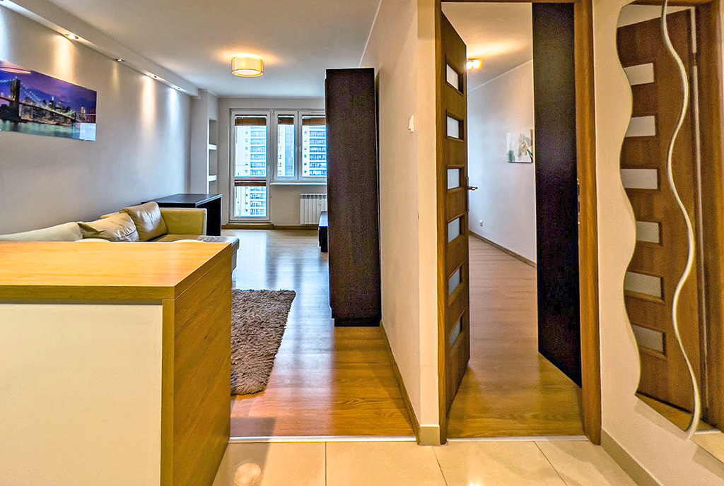 komfortowy hol w luksusowym apartamencie na sprzedaż Poznań