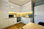 imponująca kuchnia w luksusowym apartamencie na sprzedaż Wrocław (okolice)