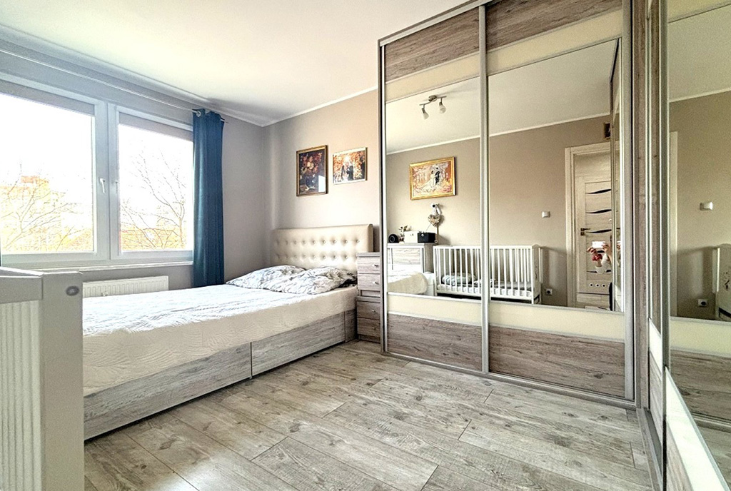 zaciszna sypialnia w ekskluzywnym apartamencie na sprzedaż Inowrocław