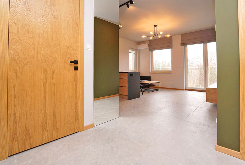 widok z holu na wnętrze luksusowego apartamentu do wynajmu Piotrków Trybunalski