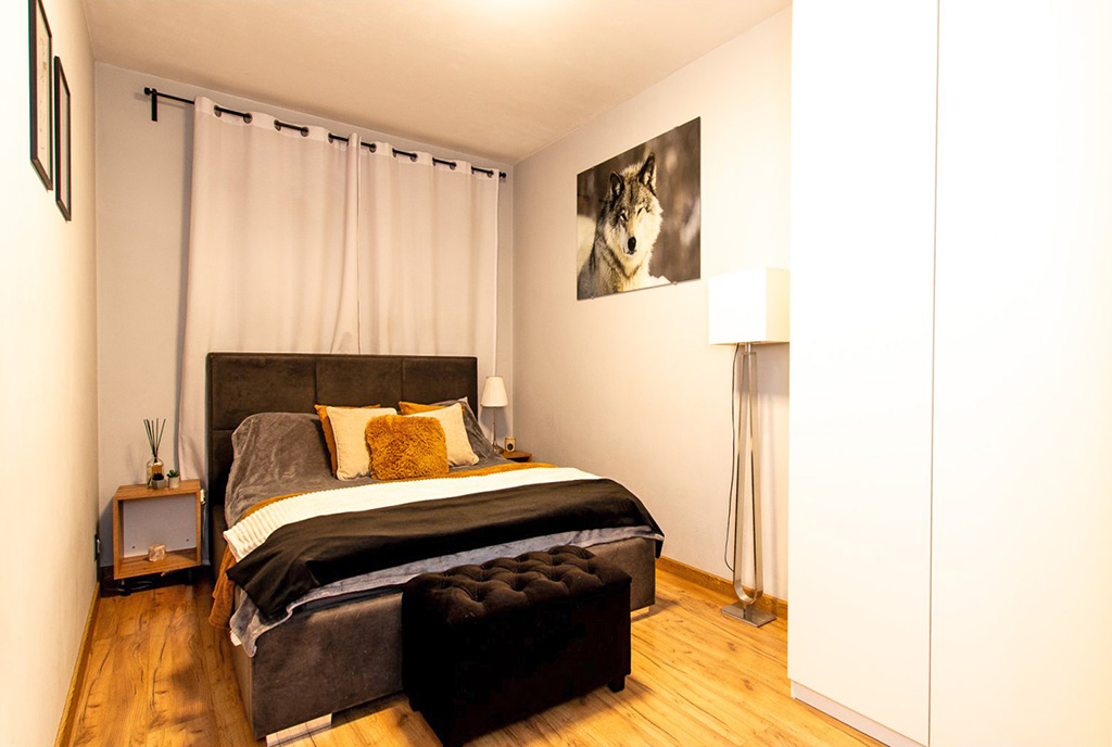 komfortowa sypialnia w ekskluzywnym apartamencie na sprzedaż Poznań (okolice)
