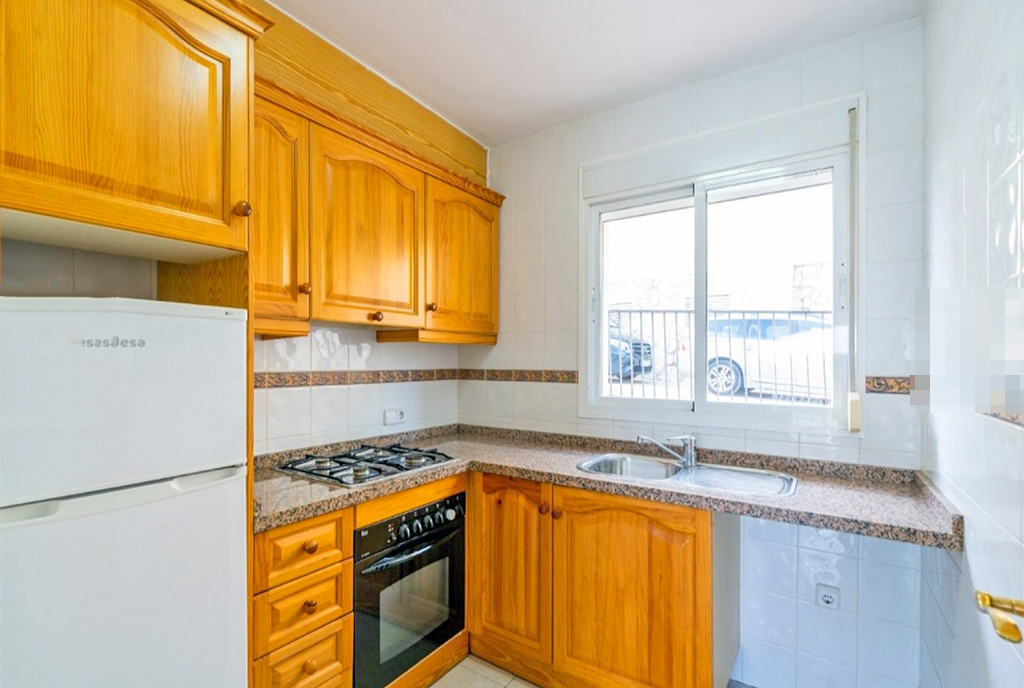 zadbana kuchnia w ekskluzywnym apartamencie na sprzedaż Hiszpania Calpe