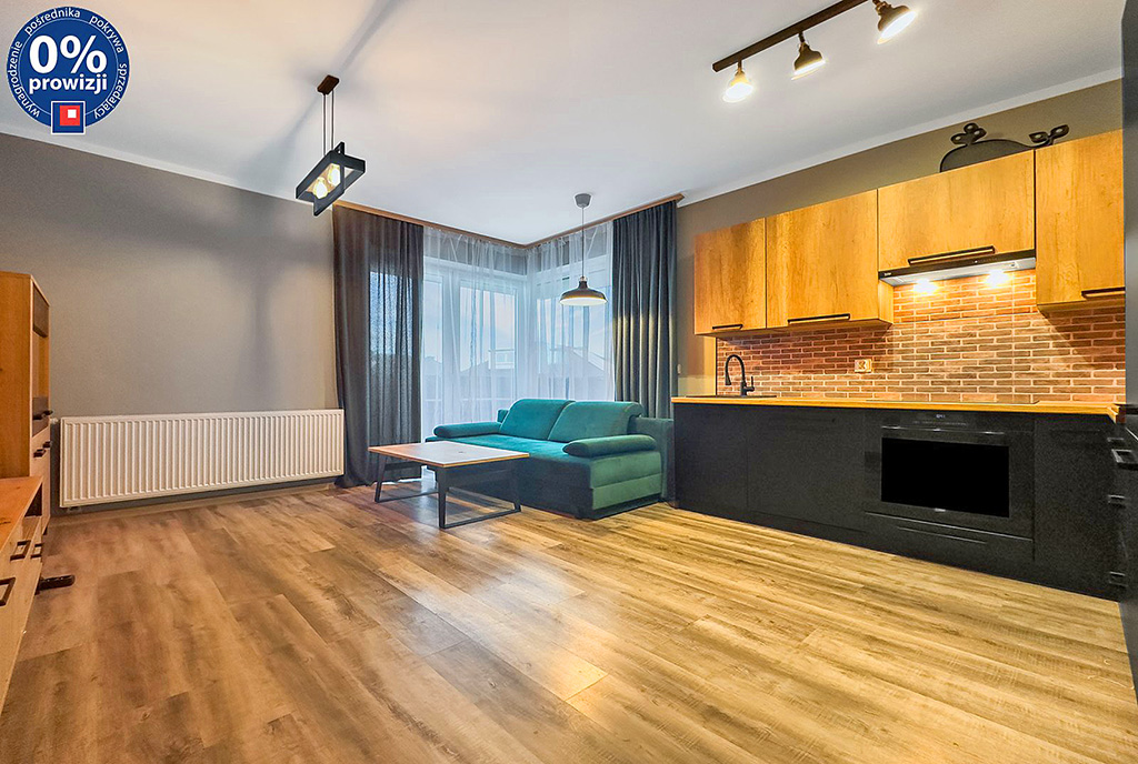 po lewej pokój dzienny, po prawej kuchnia w ekskluzywnym apartamencie do sprzedaży Katowice okolice