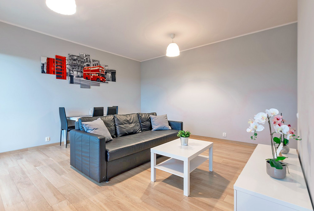 zbliżenie na pokój dzienny w luksusowym apartamencie na sprzedaż Poznań