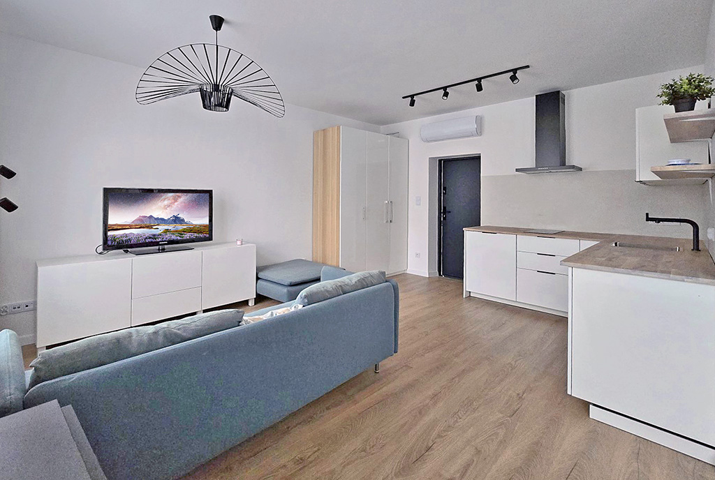 nowoczesny salon w ekskluzywnym apartamencie do sprzedaży Ustroń