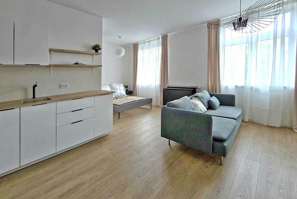 inna perspektywa pokoju dziennego w ekskluzywnym apartamencie na sprzedaż Ustroń