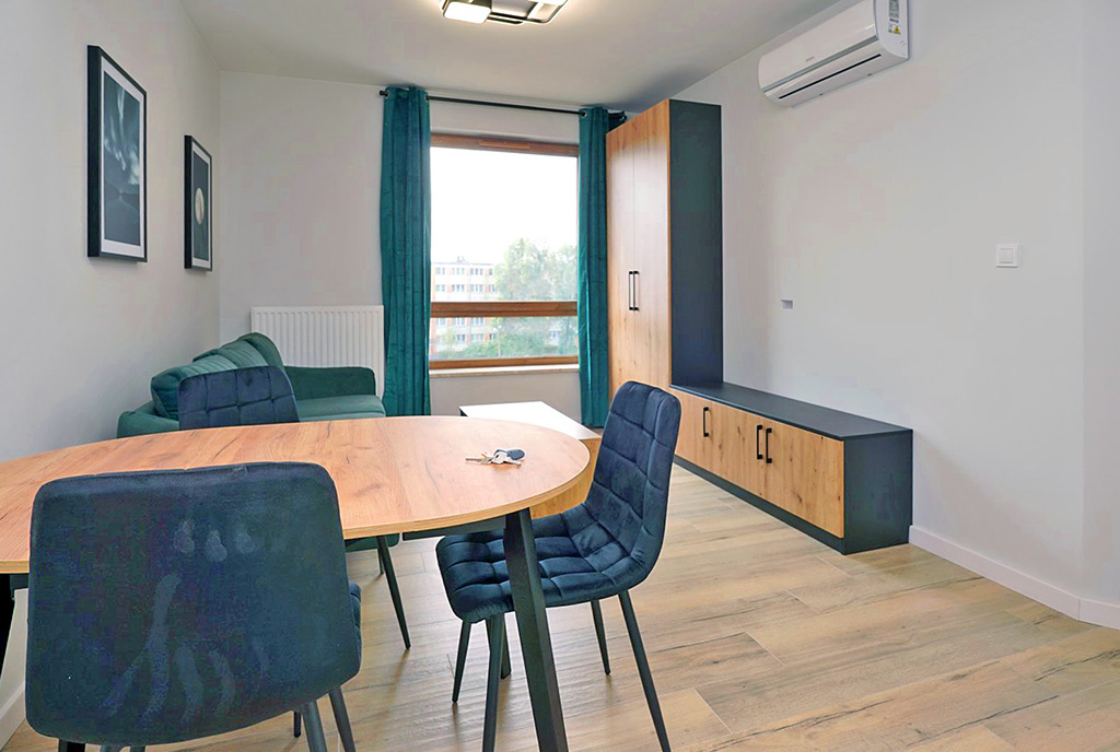 inna perspektywa salonu w luksusowym apartamencie na sprzedaż Piotrków Trybunalski