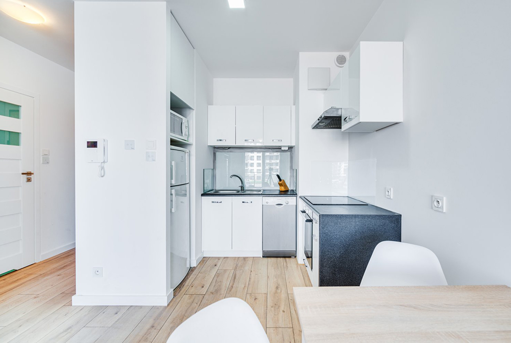 zaprojektowana zgodnie z najnowszymi trendami kuchnia w luksusowym apartamencie na sprzedaż Gdańsk