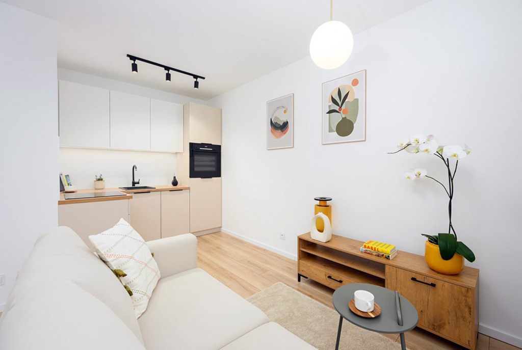 widok z salonu na aneks kuchenny w ekskluzywnym apartamencie na sprzedaż Gdańsk