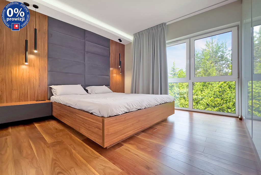efektownie oświetlona sypialnia w ekskluzywnym apartamencie na sprzedaż Katowice