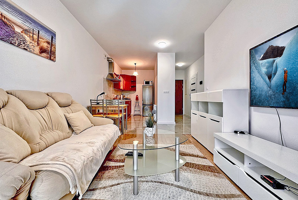 imponujący salon w ekskluzywnym apartamencie do wynajęcia Słupsk