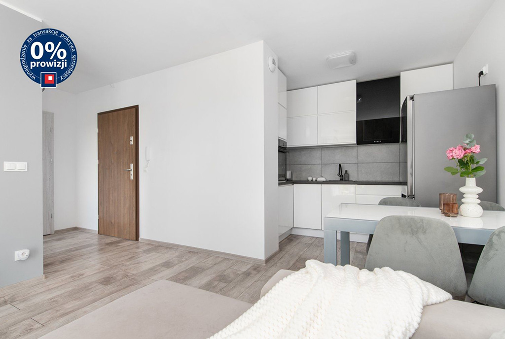 zaprojektowana w nowoczesnym stylu kuchnia w ekskluzywnym apartamencie na sprzedaż Gdynia (okolice)