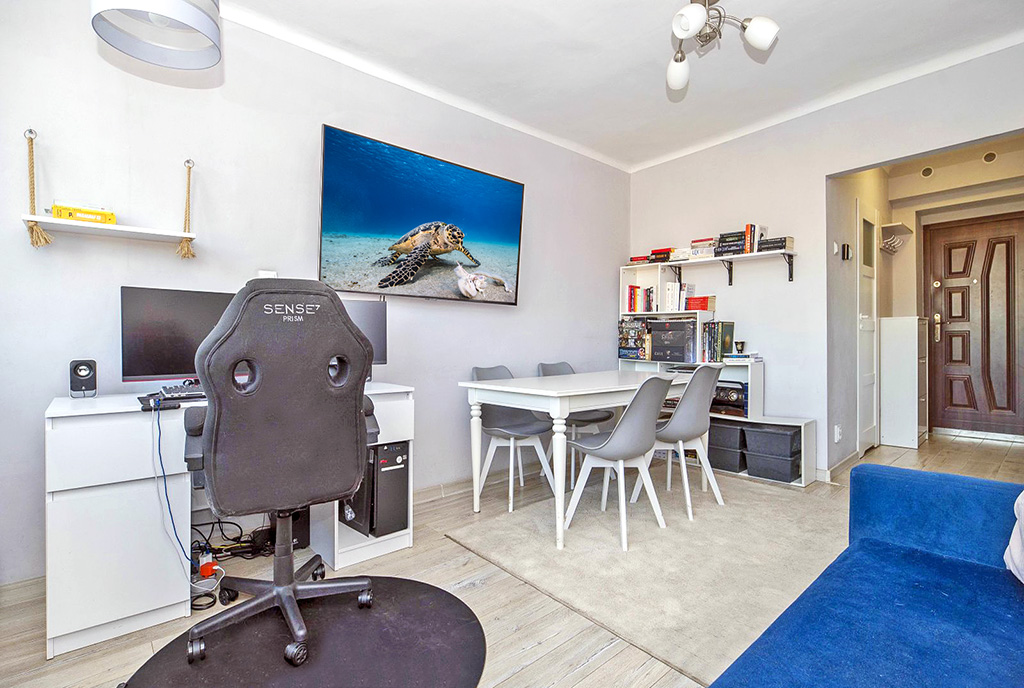 nowoczesne wnętrze salonu w ekskluzywnym apartamencie do sprzedaży Katowice (okolice)