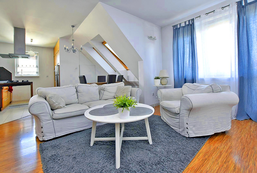 imponujący salon w ekskluzywnym apartamencie do wynajęcia Inowrocław