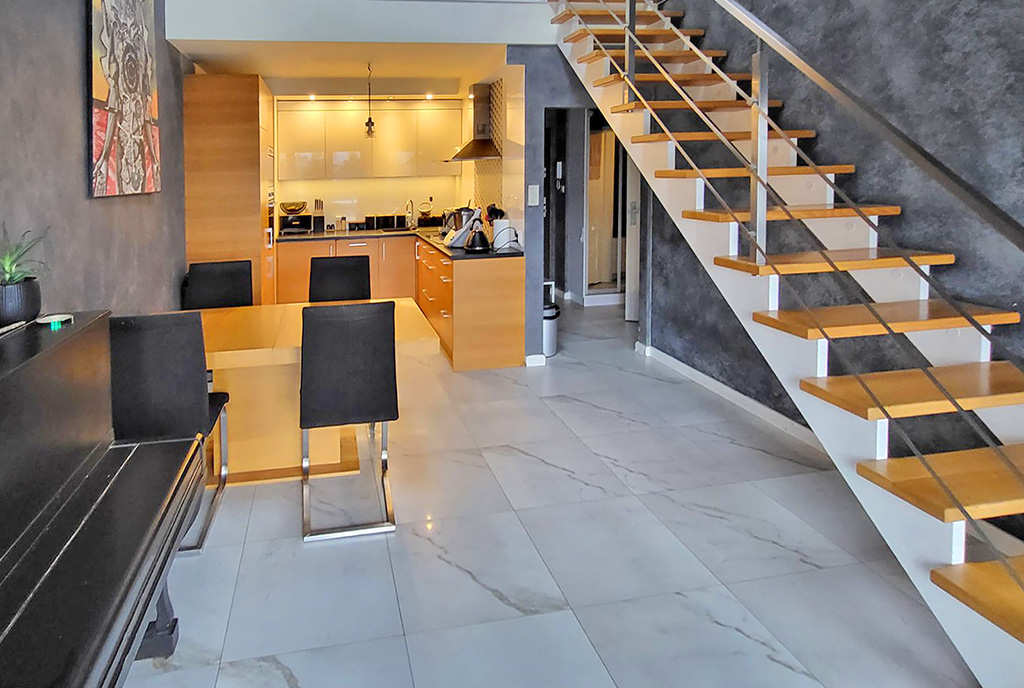 zaprojektowane w stylu loft wnętrze ekskluzywnego apartamentu do sprzedaży Wrocław