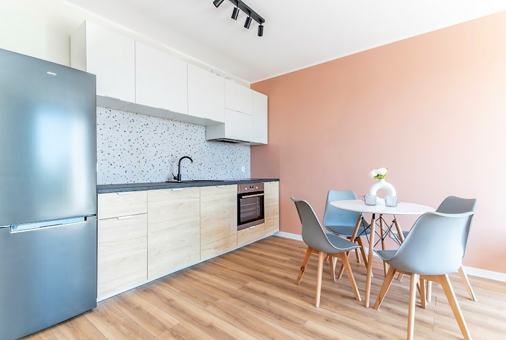 jadalni oraz aneks kuchenny w luksusowym apartamencie na wynajem Gdynia (okolice)