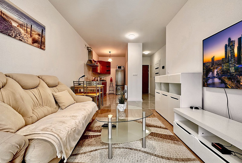 kameralny salon w ekskluzywnym apartamencie do wynajęcia Słupsk