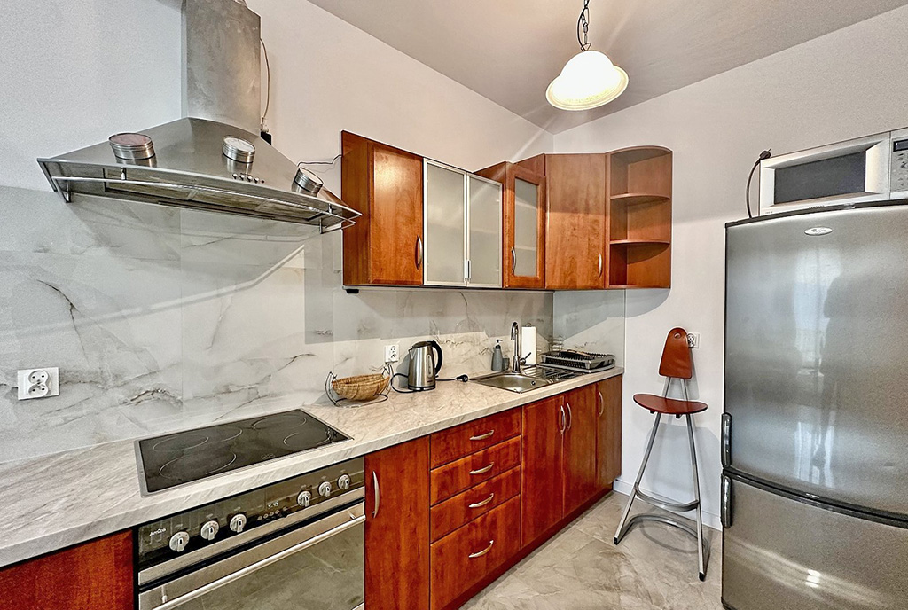 zadbana kuchnia w ekskluzywnym apartamencie na wynajem Słupsk