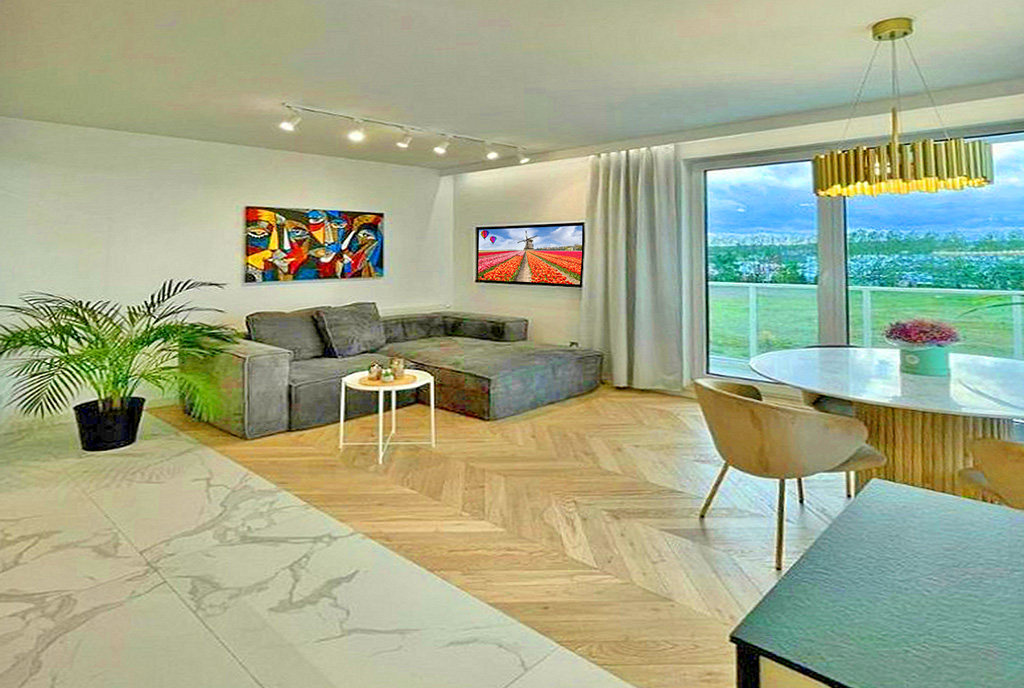 nowoczesne oświetlenie salonu w ekskluzywnym apartamencie do sprzedaży Gdańsk