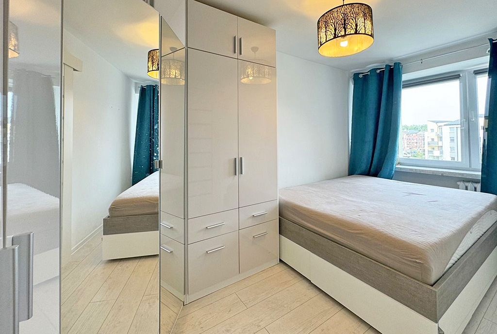 zaciszna sypialnia w ekskluzywnym apartamencie na sprzedaż Szczecin