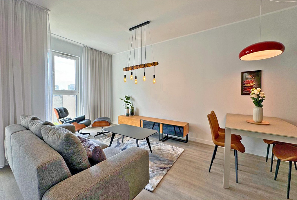 druga strona pokoju dziennego w luksusowym apartamencie do wynajmu Katowice (okolice)