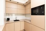 zabudowana nowocześnie kuchnia w ekskluzywnym apartamencie na wynajem Szczecin