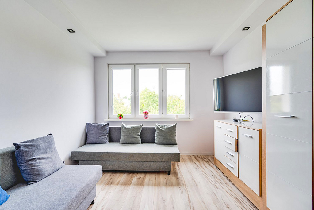zbliżenie na pokój dzienny w luksusowym apartamencie na sprzedaż Gdańsk
