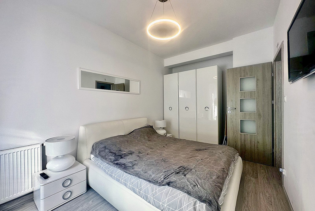 elegancka sypialnia w ekskluzywnym apartamencie na sprzedaż Słupsk