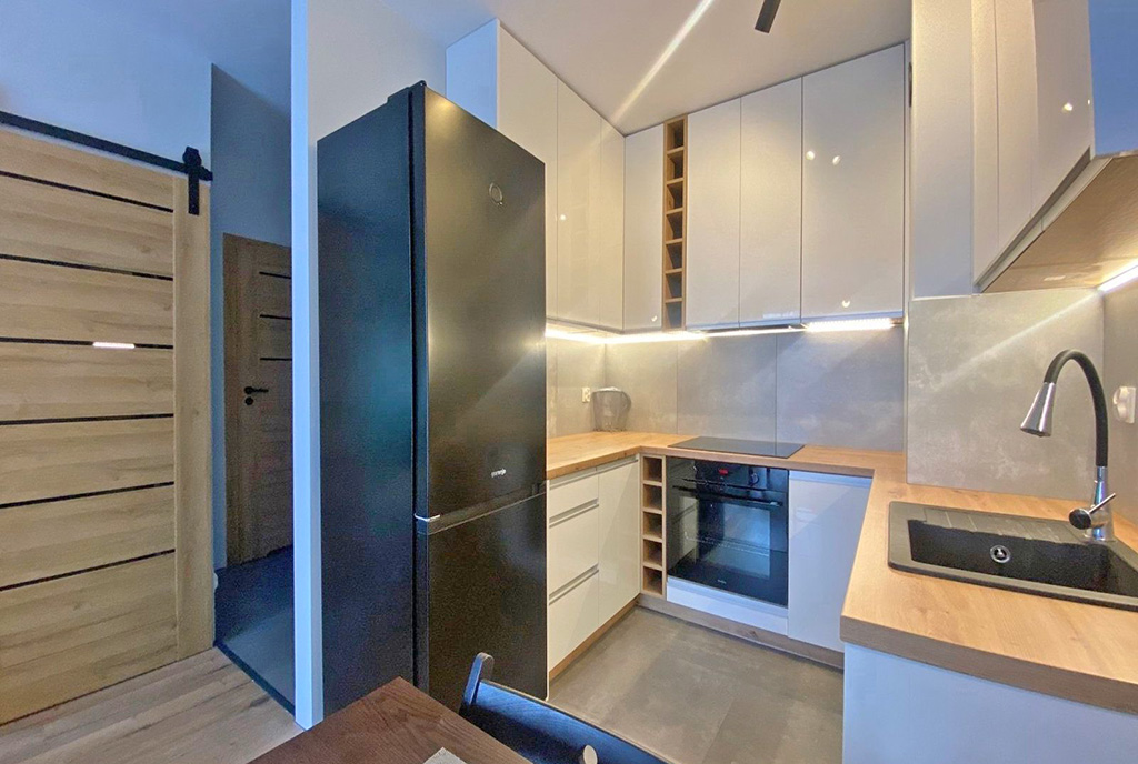 widok na aneks kuchenny w luksusowym apartamencie od wynajmu Szczecin (okolice)