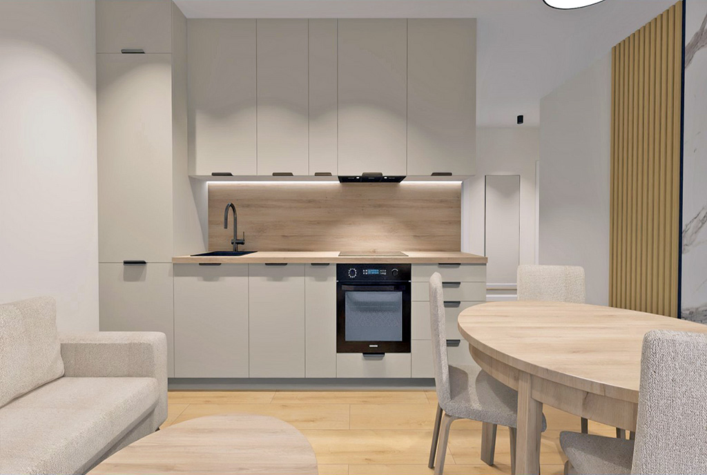 widok z salonu na kuchnię w luksusowym apartamencie na sprzedaż Elbląg