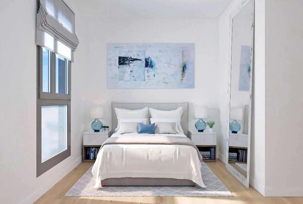 utrzymana w bieli sypialnia w ekskluzywnym apartamencie na sprzedaż Hiszpania (Malaga)