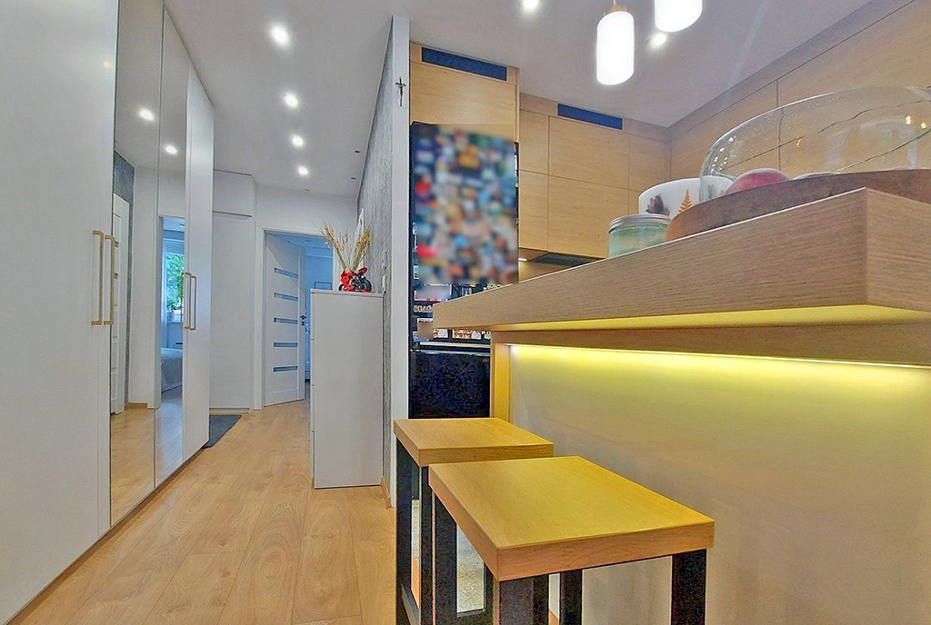 ciekawe ujęcie na kuchnię w luksusowym apartamencie na sprzedaż Katowice (okolice)