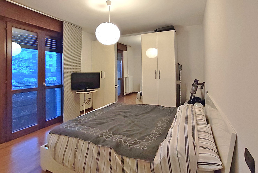 elegancka sypialnia w ekskluzywnym apartamencie na sprzedaż Włochy (Padwa)