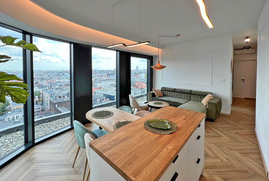 panoramiczne okna w salonie ekskluzywnego apartamentu do sprzedaży Katowice