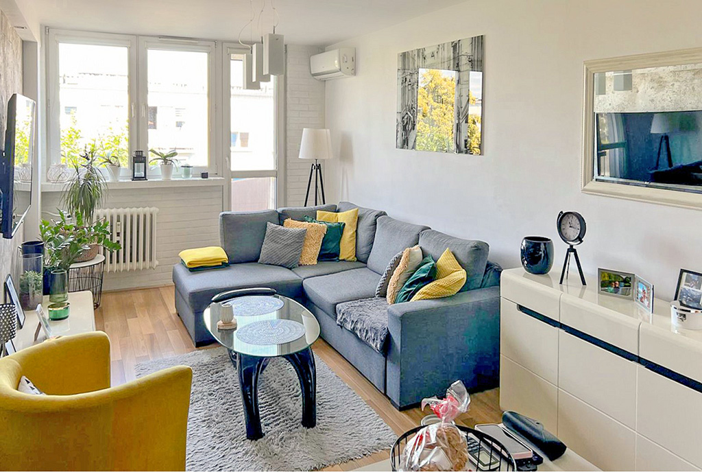 widok na salon i taras przy luksusowym apartamencie na sprzedaż Ostrów Wielkopolski