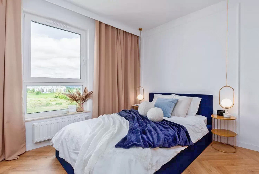 na zdjęciu sypialnia w ekskluzywnym apartamencie na sprzedaż Gdynia (okolice)