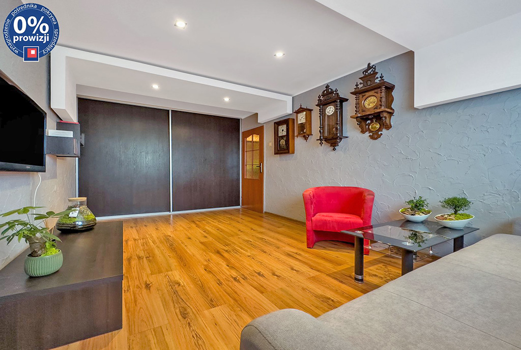 przeciwległa ściana salonu w luksusowym apartamencie na sprzedaż Katowice (okolice)