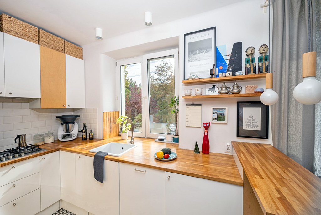 nowocześnie zaaranżowana kuchnia w ekskluzywnym apartamencie na sprzedaż Warszawa