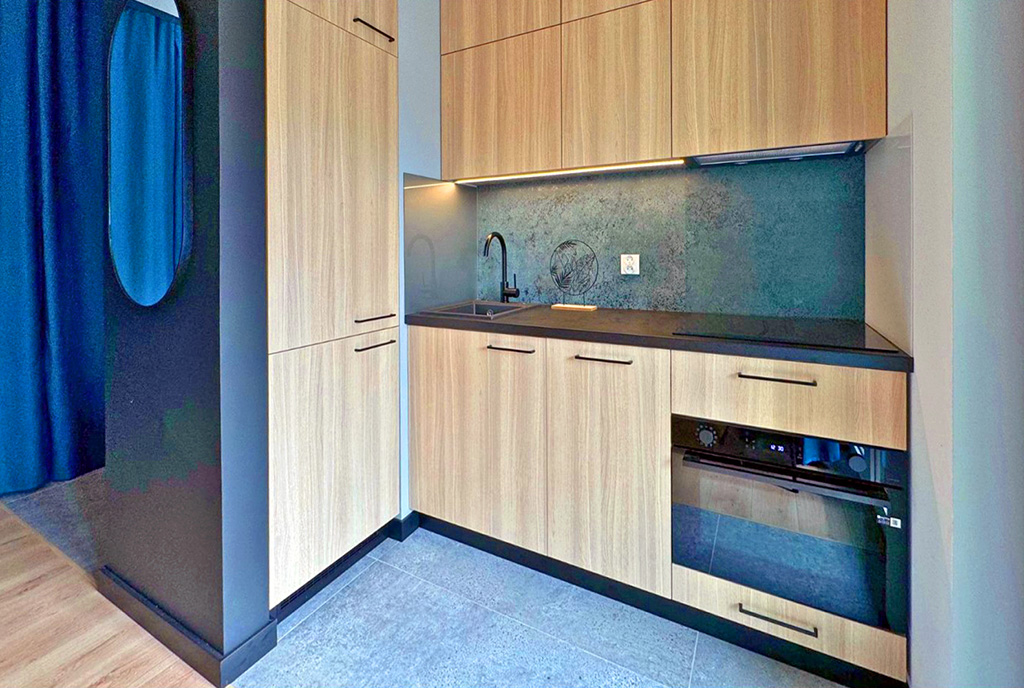 zbliżenie na kuchnię w luksusowym apartamencie do wynajmu Katowice