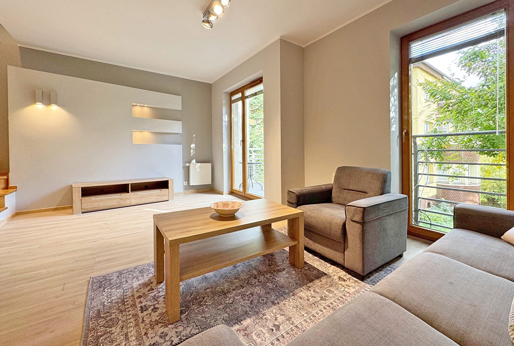 widok na pokój dzienny w luksusowym apartamencie do wynajmu Szczecin