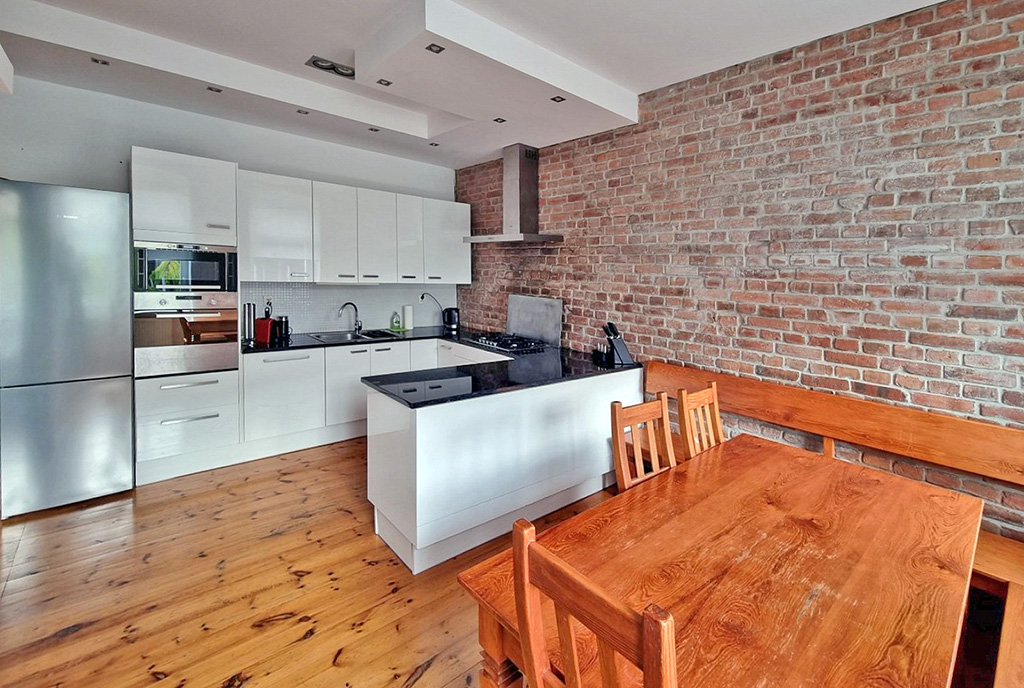zdjęcie prezentuje kuchnię w ekskluzywnym apartamencie na wynajem Wrocław