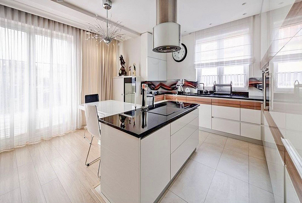 kuchnia z wyspą w ekskluzywnym apartamencie na sprzedaż Gdańsk (okolice)