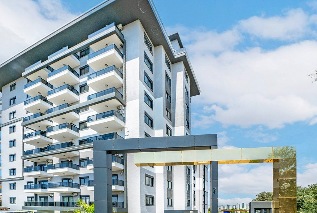widok na apartamentowiec, w którym znajduje się oferowany do sprzedaży ekskluzywny apartament Turcja (Avsallar)
