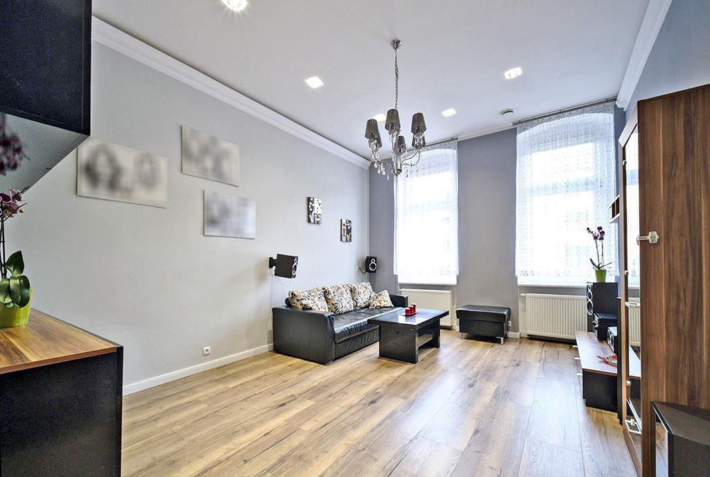 widok na pokój dzienny w luksusowym apartamencie na sprzedaż Wrocław
