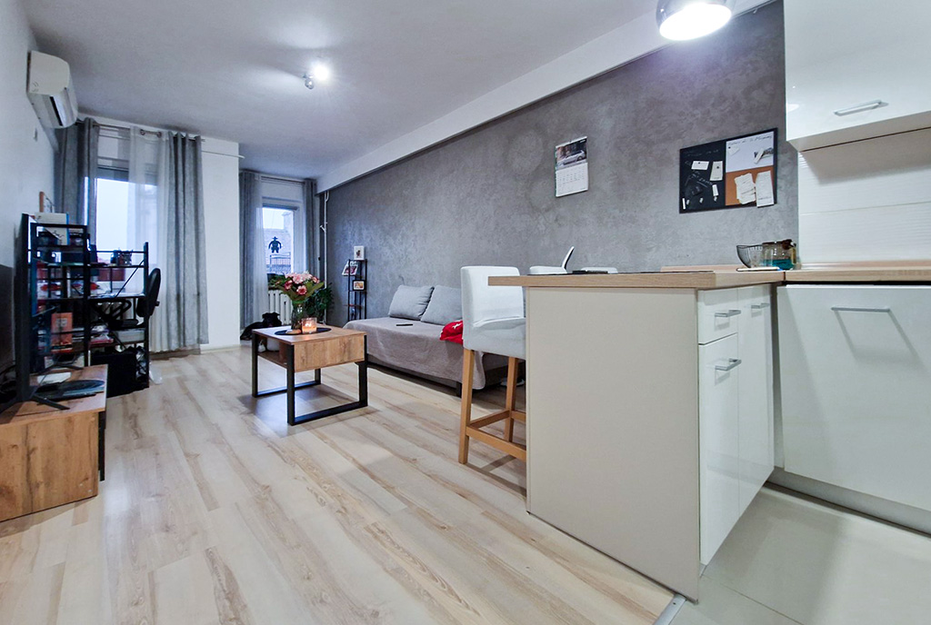 widok od strony kuchni na salon w ekskluzywnym apartamencie do sprzedaży Zielona Góra okolice