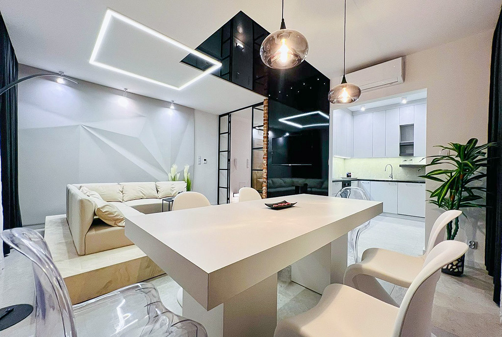 na pierwszym planie jadalnia w luksusowym apartamencie do wynajmu Piotrków Trybunalski