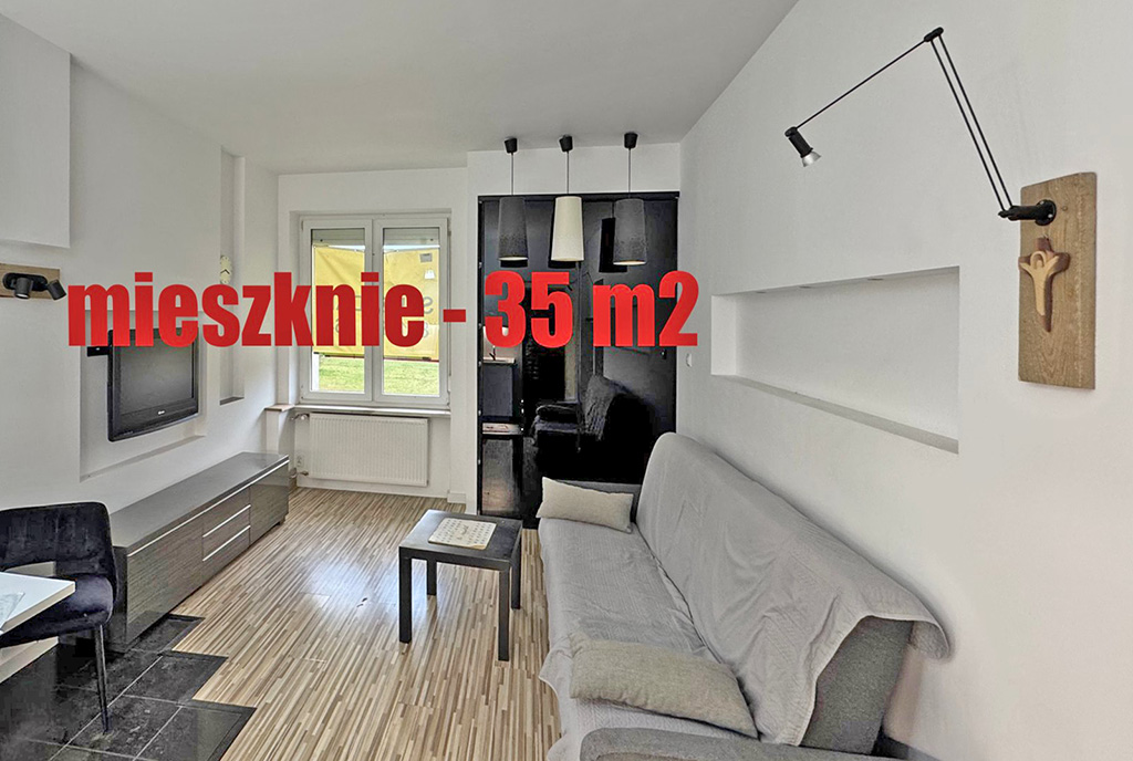widok na pokój dzienny w luksusowym apartamencie na sprzedaż Kielce
