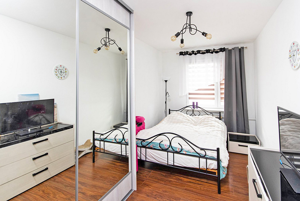 dystyngowana sypialnia w ekskluzywnym apartamencie na sprzedaż Szczecin