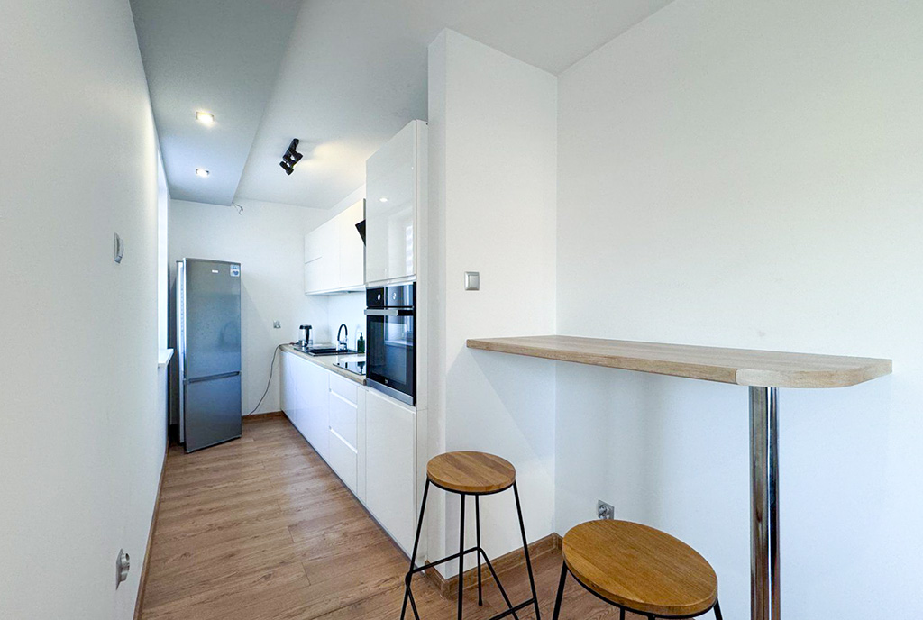nowoczesna kuchnia w luksusowym apartamencie do wynajmu Ostrów Wielkopolski